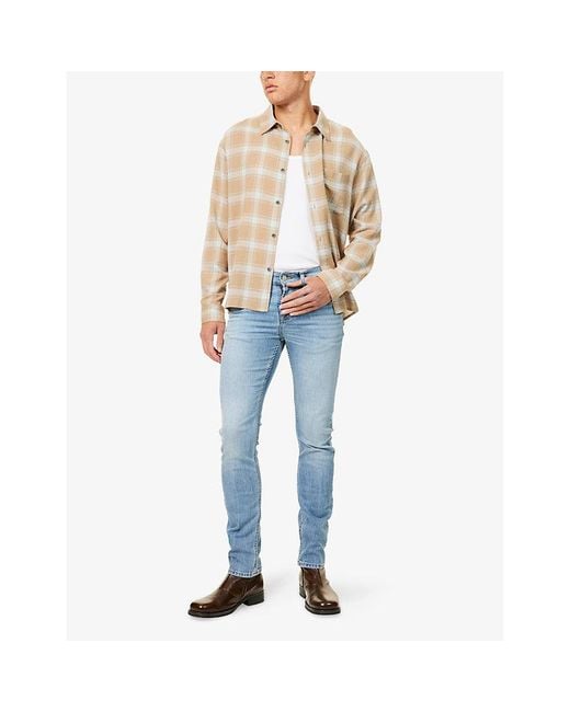 7 For All Mankind Blue Slimmy Tapered Brand-Patch Stretch-Denim Jeans for men