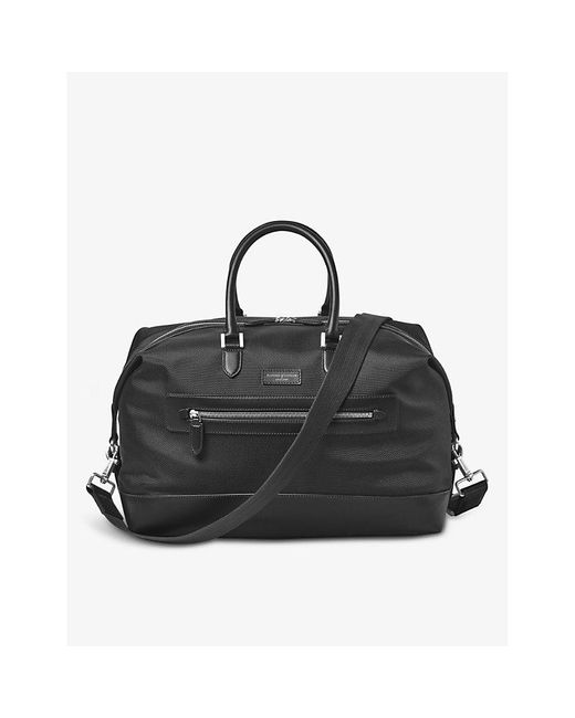 Aspinal of London Logo embellished Woven Duffle Bag in Black