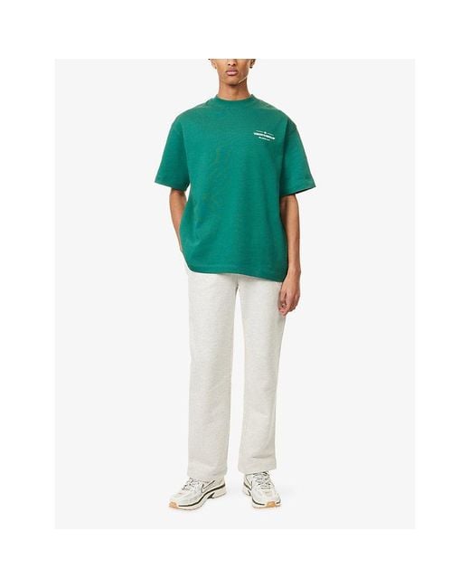 The Couture Club Green Copyright Graphic Text-Print Cotton T-Shirt for men