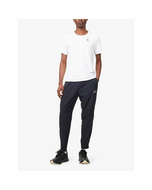Nike Blue Dri-Fit Standard-Fit Stretch-Woven Jogging Bottoms for men