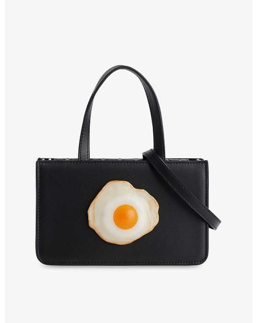 Puppets and Puppets Black egg-appliqué Small Leather Top-handle Bag