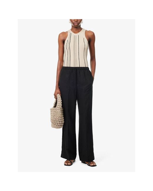 Totême  Black Wide-leg Relaxed-fit Woven Trousers