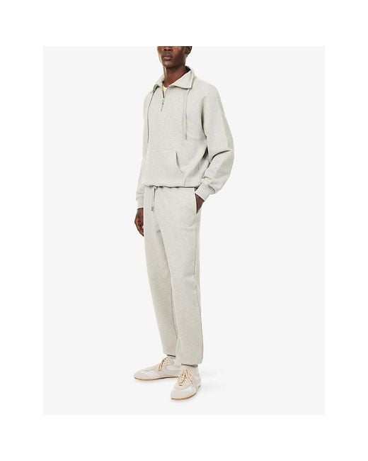 AMI Gray Embroidered Ami De Coeur Cotton-Jersey Jogging Bottoms for men