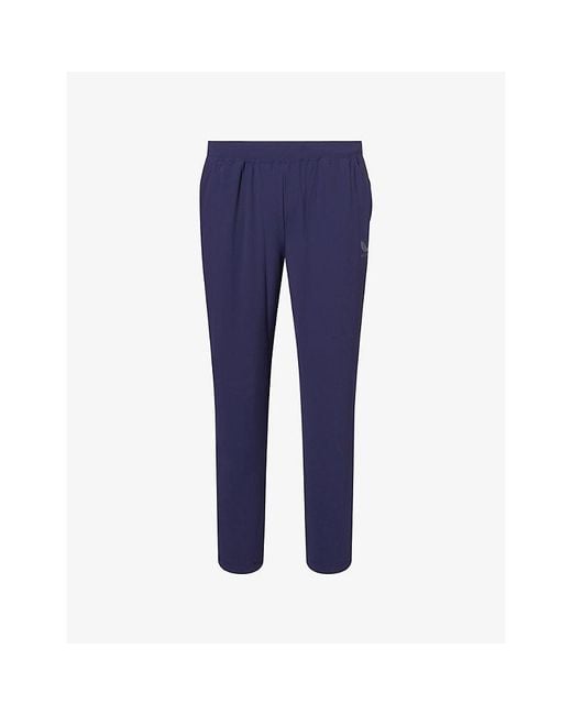 Castore Blue Pewter Flex Tech Logo-Print Stretch-Woven Trousers for men
