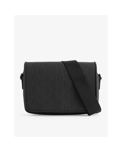 Gucci Monogramdebossed Leather Crossbody Bag in Black for Men Lyst