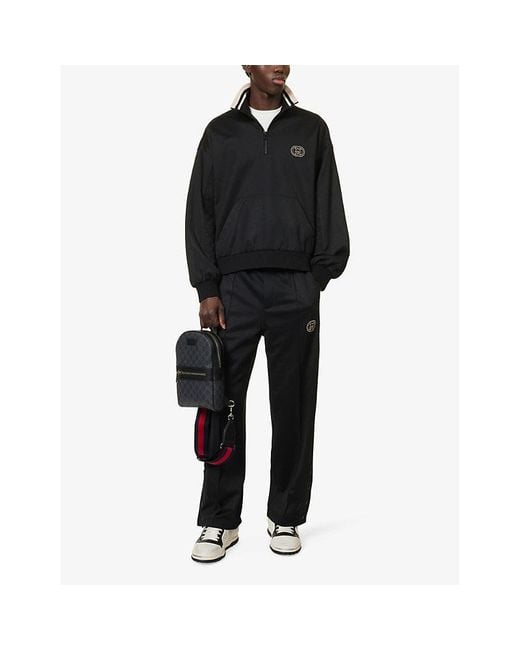 Gucci Black Monogram-embellished Coated-canvas And Leather Backpack for men