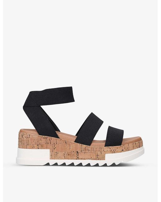 black stretchy platform sandals