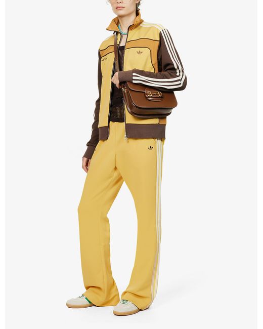 adidas Logo-embroidered Flared Mid-rise Recycled-polyester Blend jogging  Bottoms in Yellow | Lyst