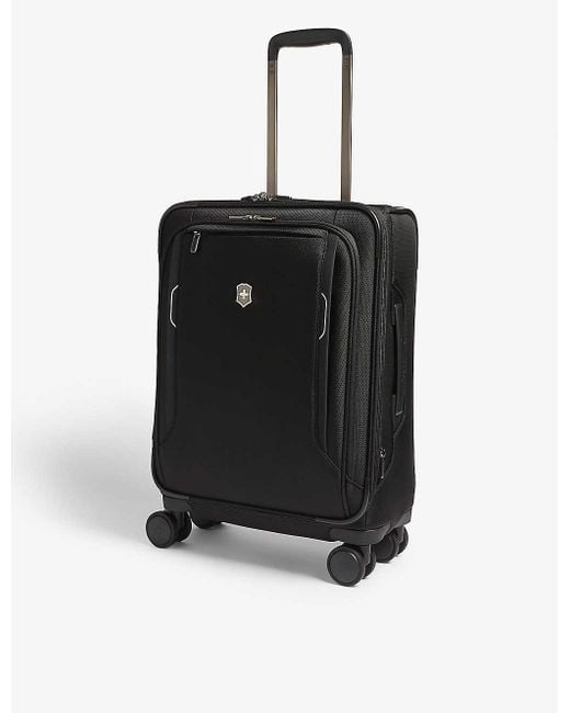 black four wheel suitcase