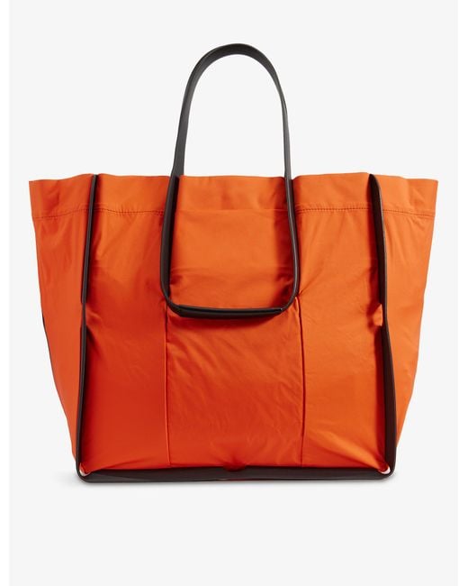 Homme Plissé Issey Miyake Pole Panelled Shell Tote Bag in Orange for ...