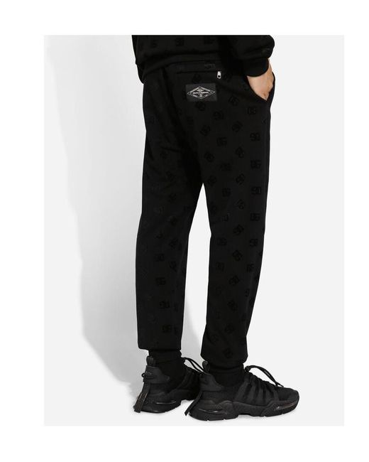 Dolce & Gabbana Black Monogram-Embossed Cotton Track Pants for men