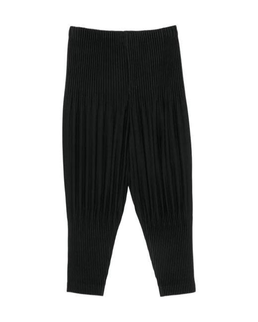 Homme Plissé Issey Miyake Black Plissé-Effect Tapered Trousers for men