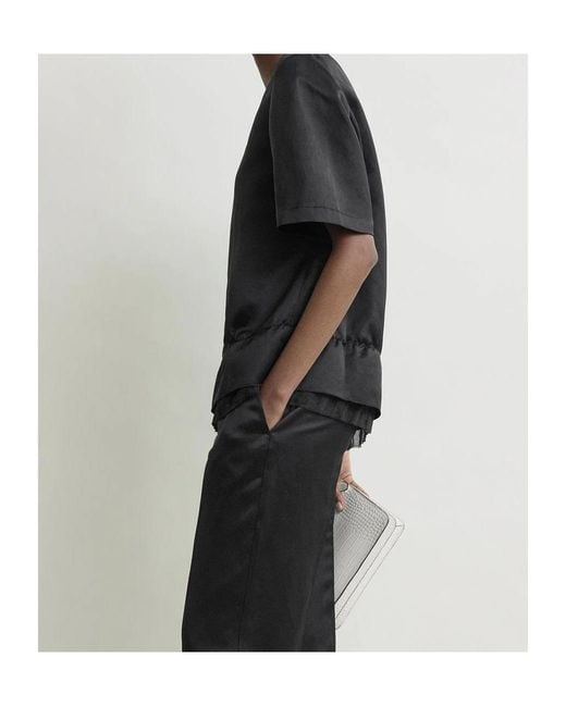 Totême  Black Totême V-Neck Short Sleeved Top