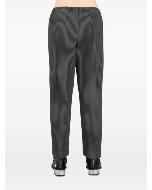 Homme Plissé Issey Miyake Gray Homme Plissé Issey Miyake Pleated Tapered Leg Trousers for men