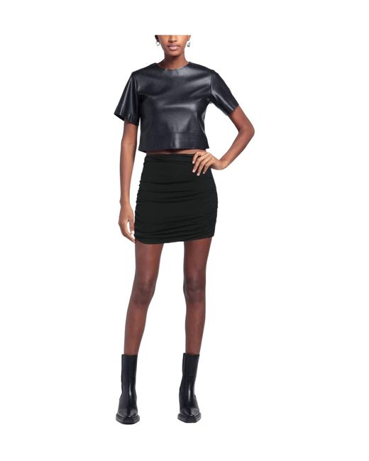 Tory Burch Black Mini Skirts