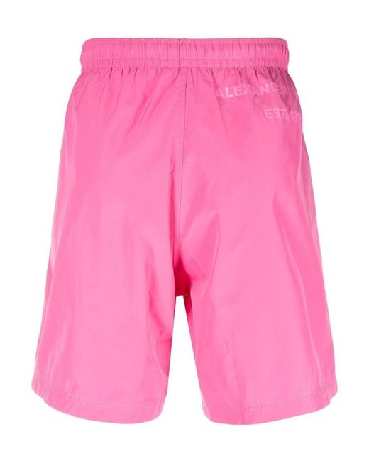McQueen Pink Graffiti Logo Swim Shorts for men