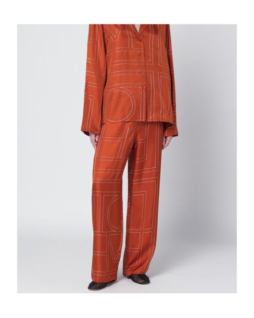 Totême Orange Monogram Silk Pajama Trousers