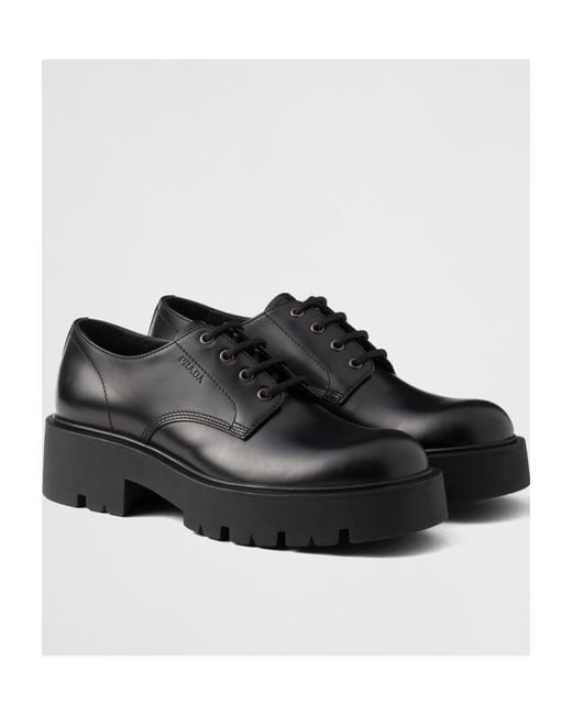 Prada Black Brushed Leather Derby Shoes for men