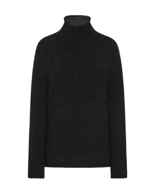 The Row Long-Sleeved Turtleneck Sweater in Black Lyst
