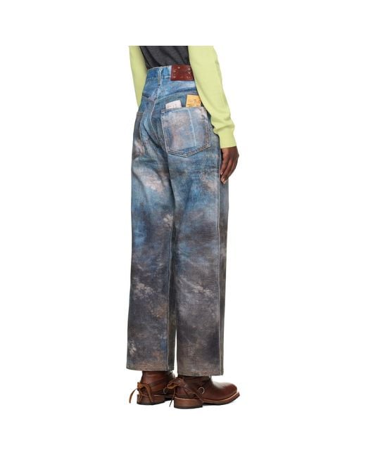 ANDERSSON BELL Blue Festival Mud Printed Jeans for men
