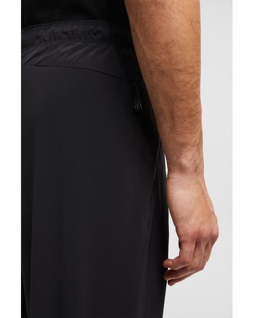 Moncler Black Logo Patch Cuffed Pants for men