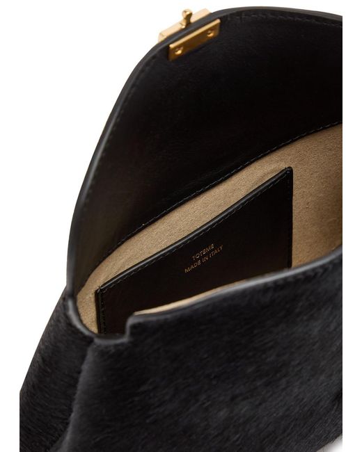 Totême Black T-Lock Mini Horsehair Clutch