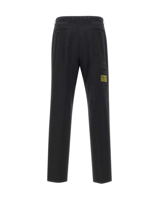 MM6 by Maison Margiela Black Buttoned Tailored Trousers for men