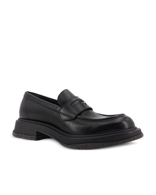 Gucci Black Tonal Logo Loafers for men
