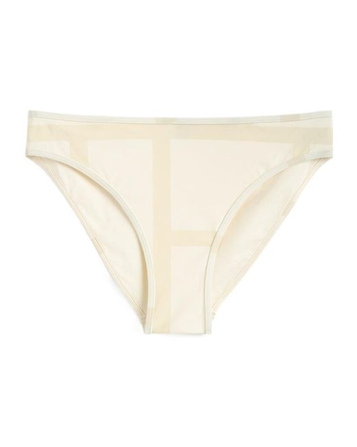 Totême  Natural Monogram Printed Swim Shorts