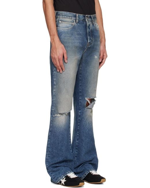 Amiri Blue Ripped-Knees Bootcut Denim Jeans for men