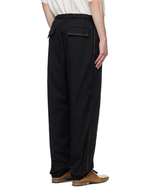 Undercover Black Logo Tape-Detail Trousers for men