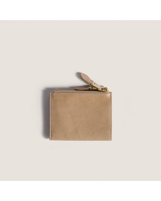 Miu Miu Natural Logo Embossed Zipped Wallet