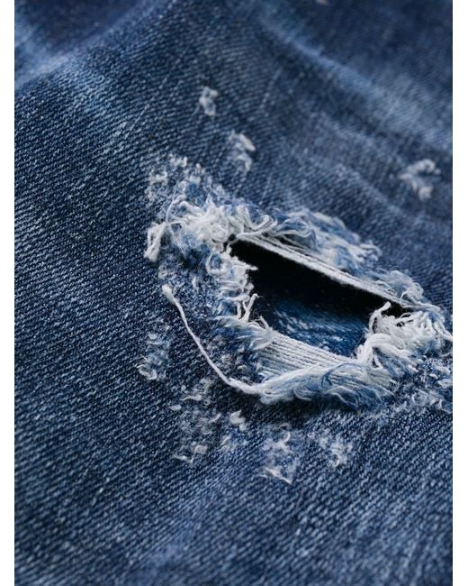 DSquared² Blue Ripped Mid-Rise Skinny Jeans for men