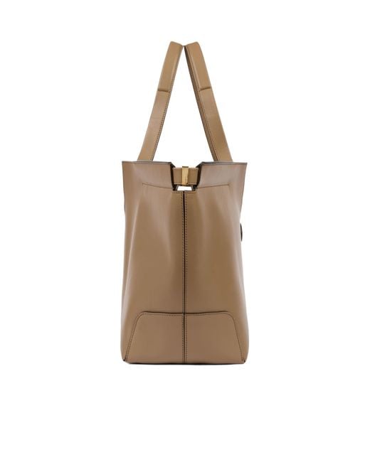 Tod's Natural Logo Debossed Medium Tote Bag