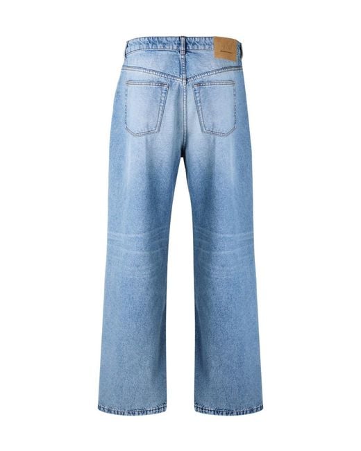 AMI Blue Solid Color Denim Long Pants for men