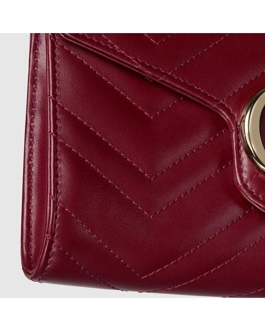 Gucci Red Logo Plaque Quilted Clutch Bag