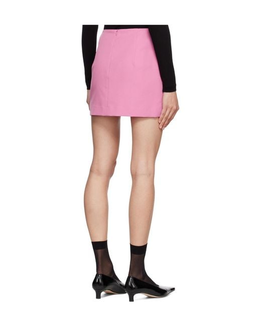 Pushbutton Pink Slit Mini Skirt