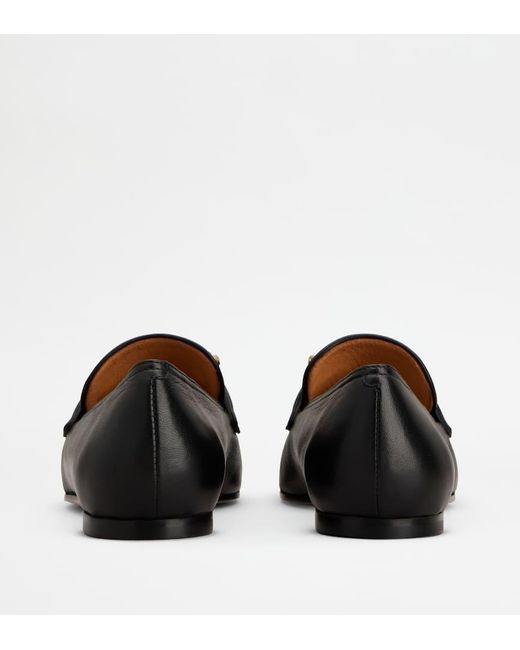 Tod's Black Round-Toe Slip-On Loafers