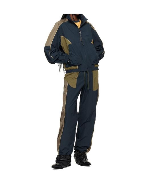 ANDERSSON BELL Blue Color-Blocked Sweatpants for men