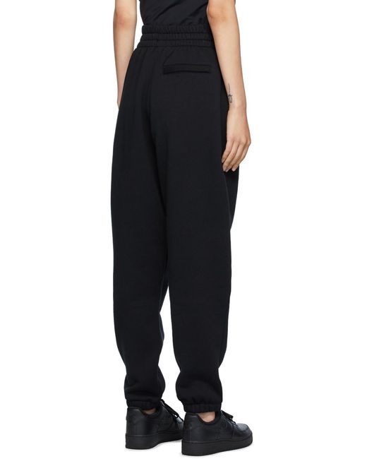 T By Alexander Wang Black Alexander Wang Logo Printed Elasticated Waist Pants