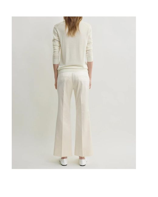 Totême White Totême Kick Flare Raw-Edge Pants
