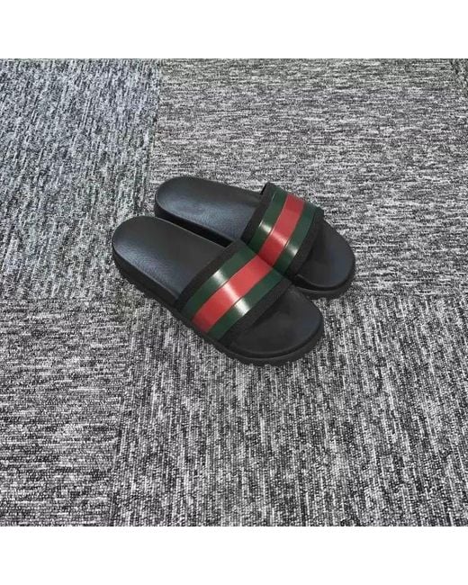Gucci Black Pursuittreck Striped Rubber Slides for men