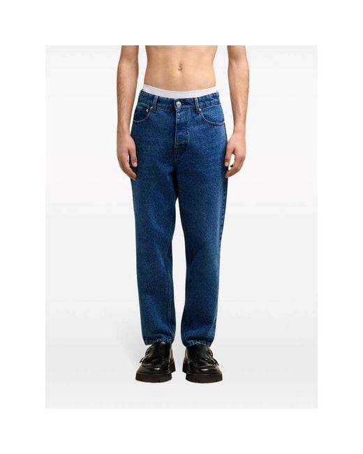 AMI Blue Logo Patch Tapered-Fit Jeans for men