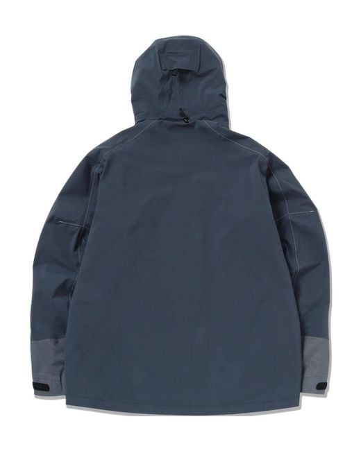 And Wander Blue Zip Pocket Hooded Jacket for men