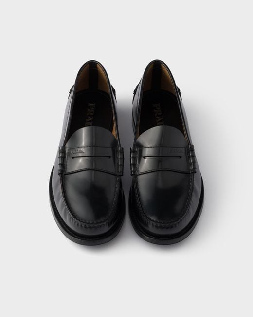 Prada Black Logo-Embossed Loafers for men