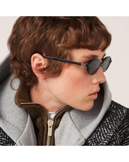 Miu Miu White Eyewear Oval Frame Full Rim Sunglasses