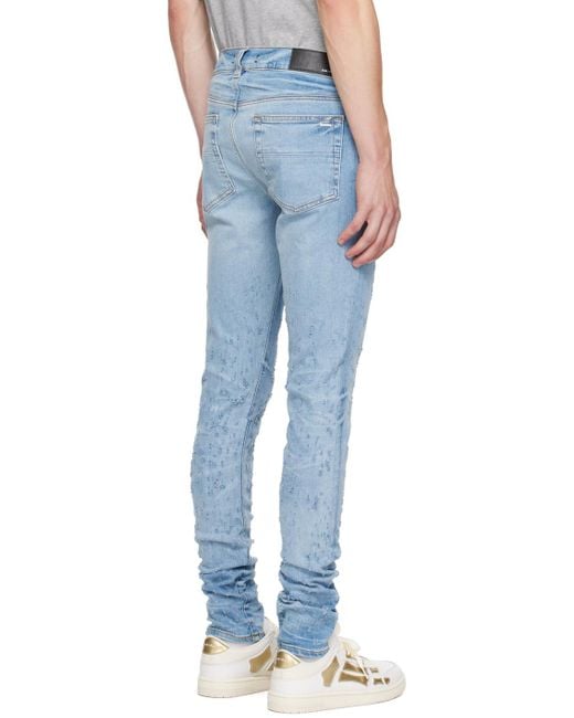 Amiri Blue Shotgun Ripped Skinny Jeans for men