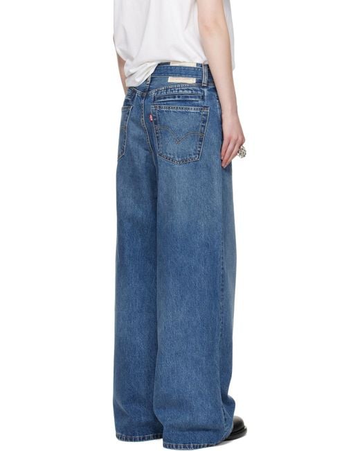 Sacai Blue Logo Patch Wide-Leg Belted Jeans