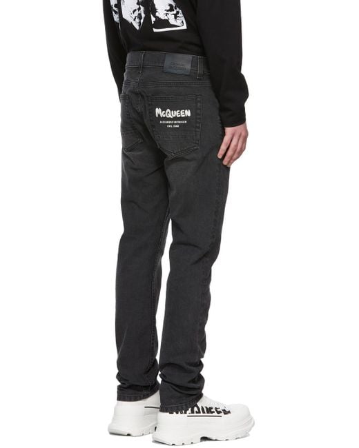 McQueen Black Graffiti Logo Embroidered Jeans for men