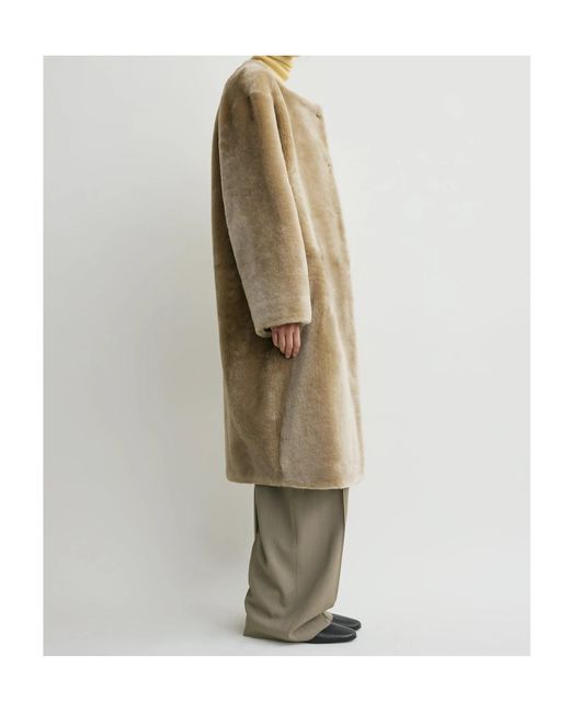 Totême Natural Collarless Shearling Coat Rye